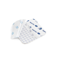 Hydrogelverband HydroTac transparent, gefaltetes Stück mit Aufdruck und blauem Raster