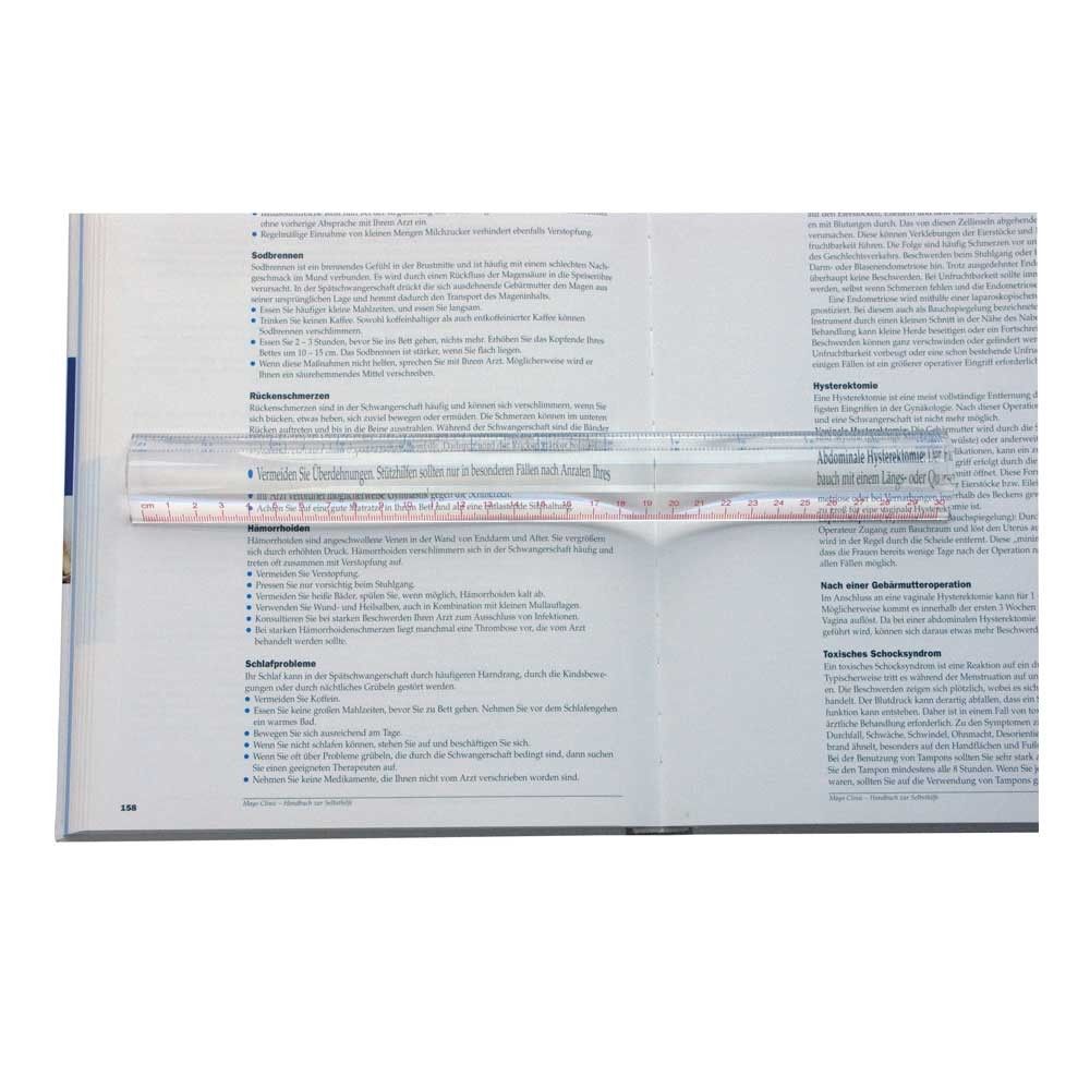 2-fach Lupe über bedruckten Textseiten, transparente Vergrößerung im Lesebereich
